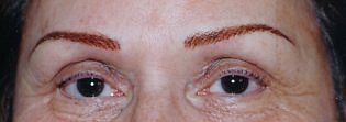 client after permanent eyebrows